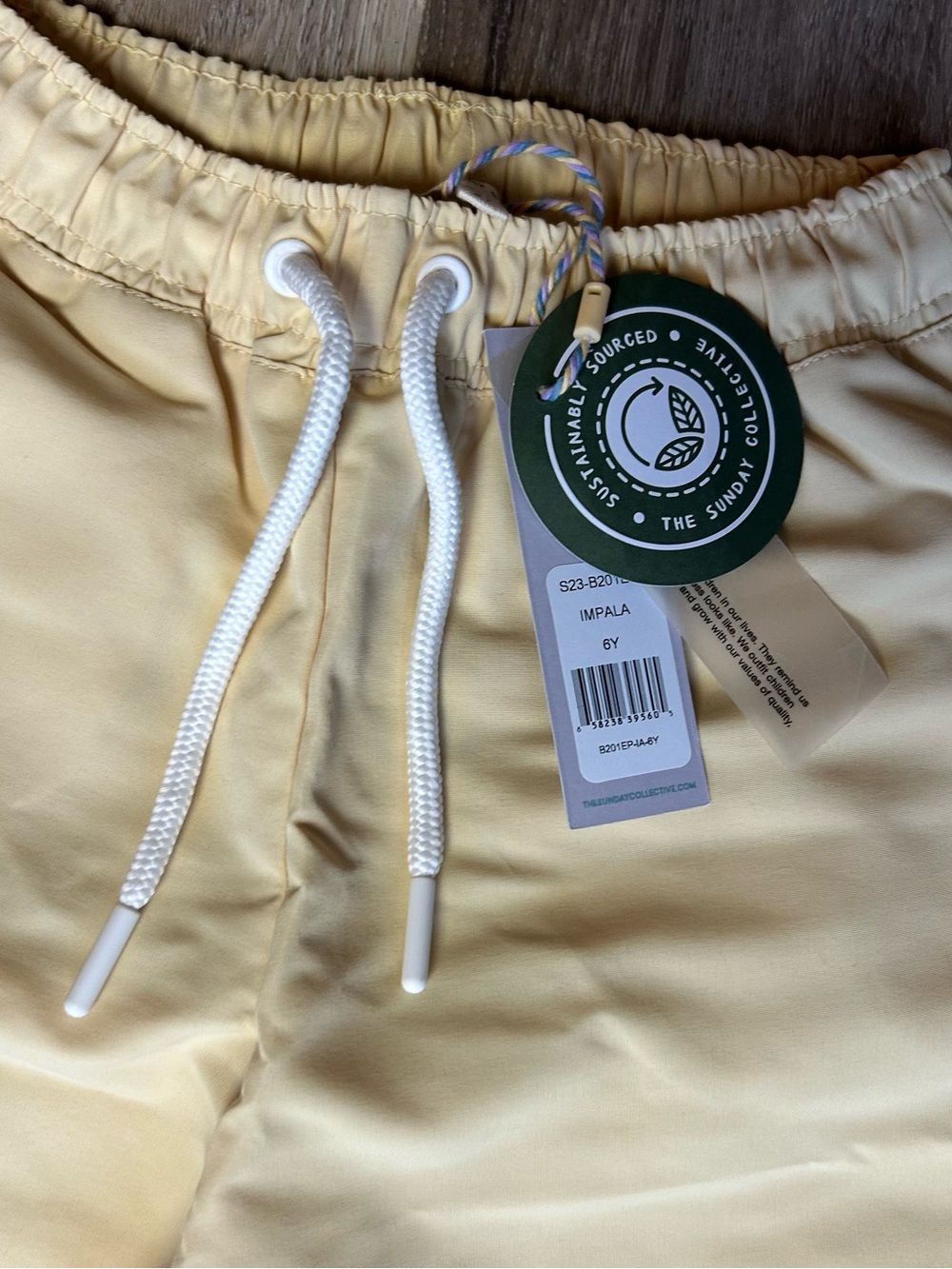 Kid’s Drawstring Swim Shorts in Pale Yellow - Picture 5 of 10